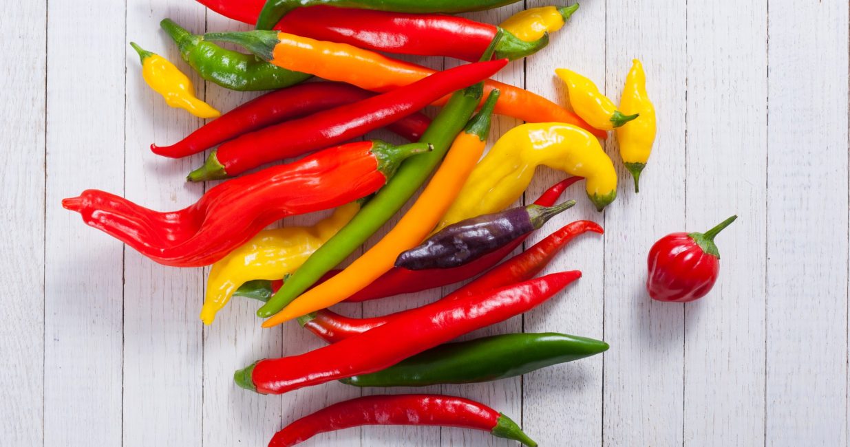 Chili,Pepper,Selection,On,White,Wood,Table,Background
